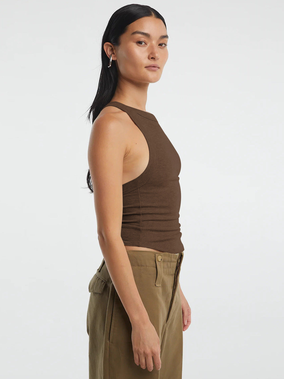 Side view highlighting the cropped top’s shape