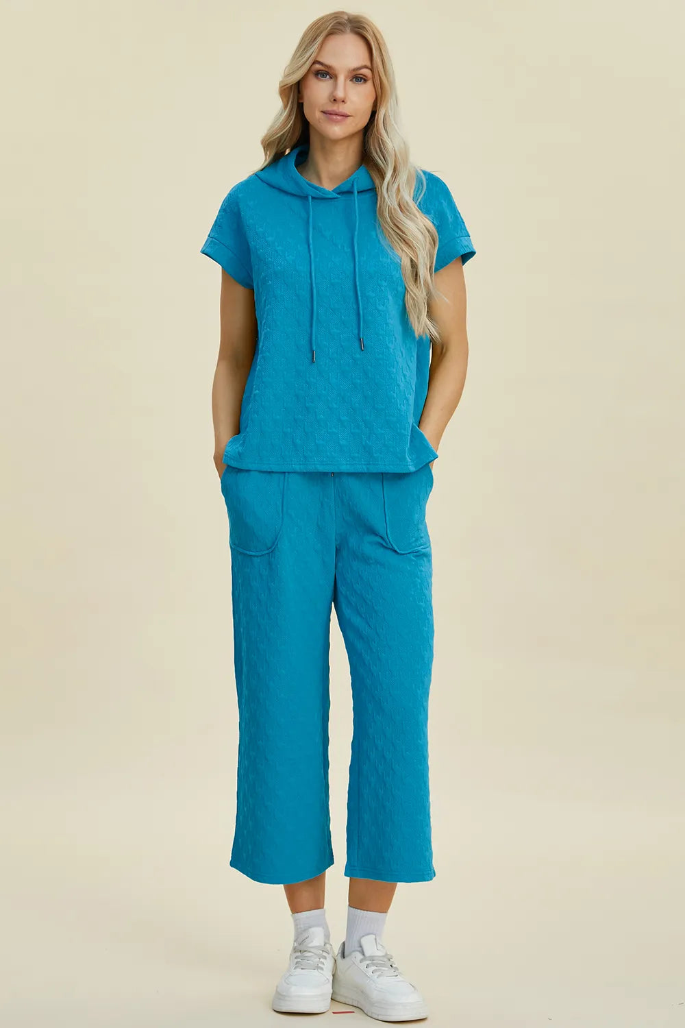 Stylish outfit highlighting textured fabric and relaxed design