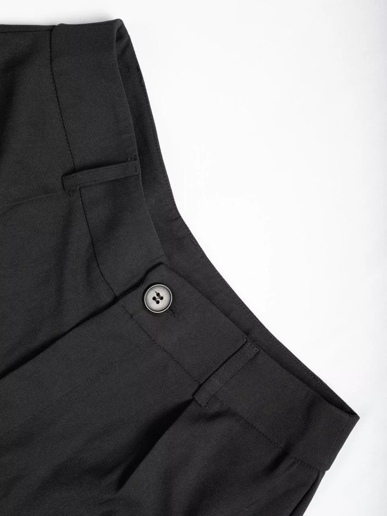 Waist detail of high-waisted wide-leg pants