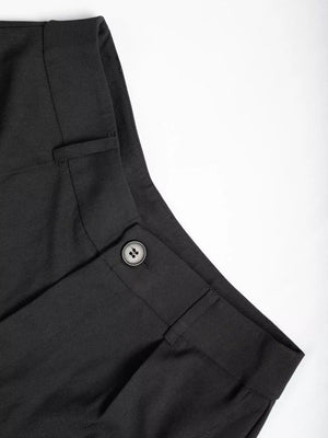 Waist detail of high-waisted wide-leg pants