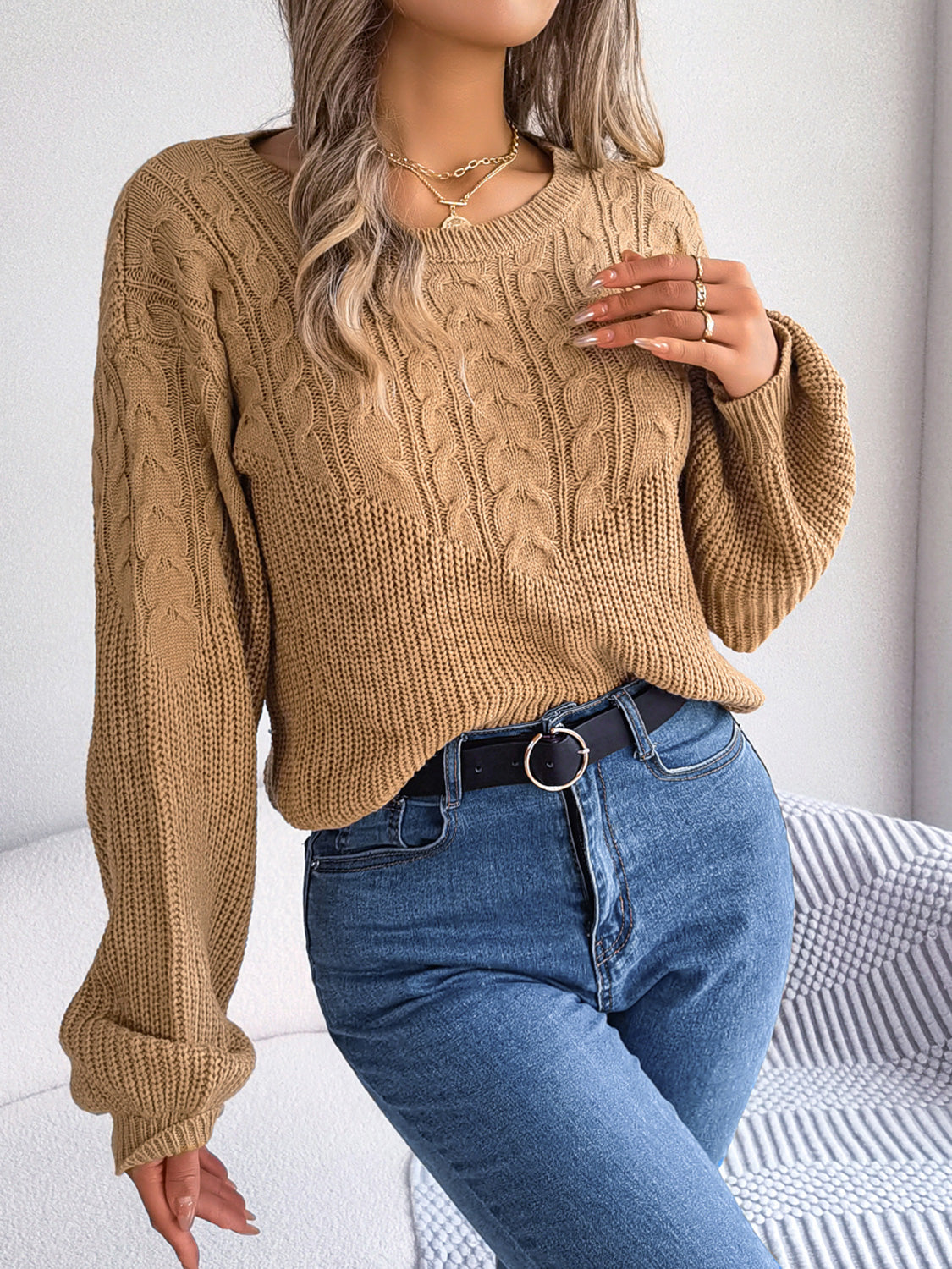 Stylish cable-knit sweater front look with loose fit and winter outfit