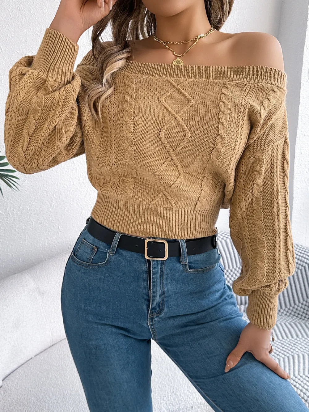 Cable knit off shoulder long sleeve sweater front view stylish winter knitwear