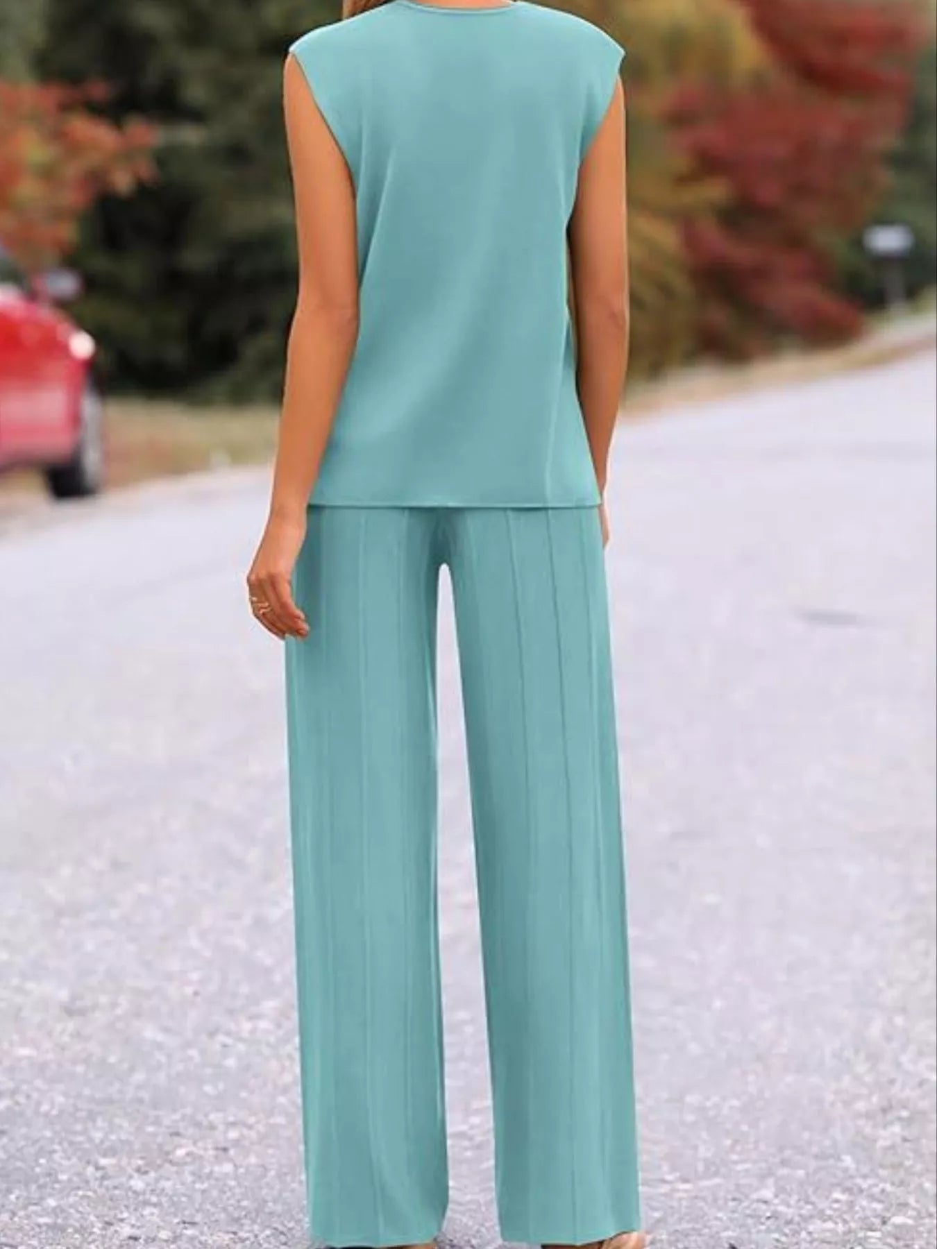 Back styled view of casual solid color knit set