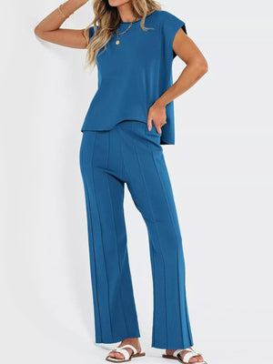 Front view of casual solid color cap sleeve top and pants knit set