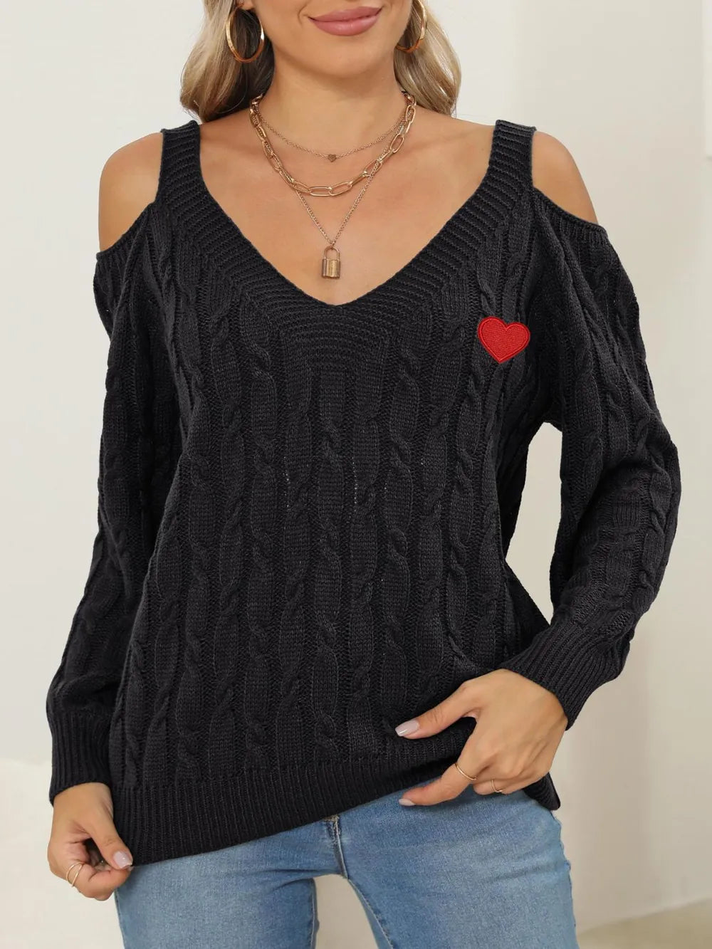 Women's Cable-Knit Heart V-Neck Sweater front display for winter fashion