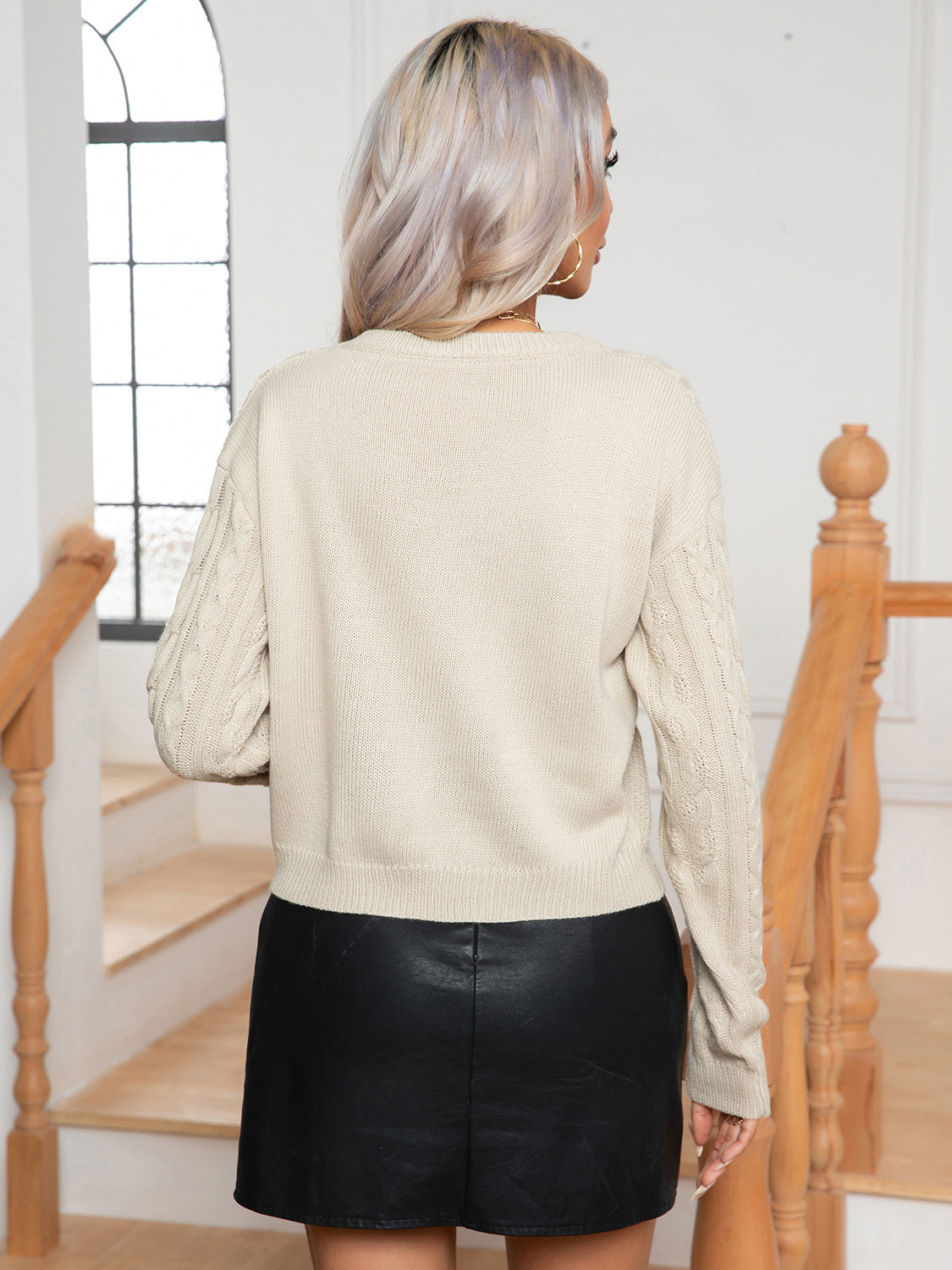 Back view cable knit long sleeve sweater relaxed fit winter outfit
