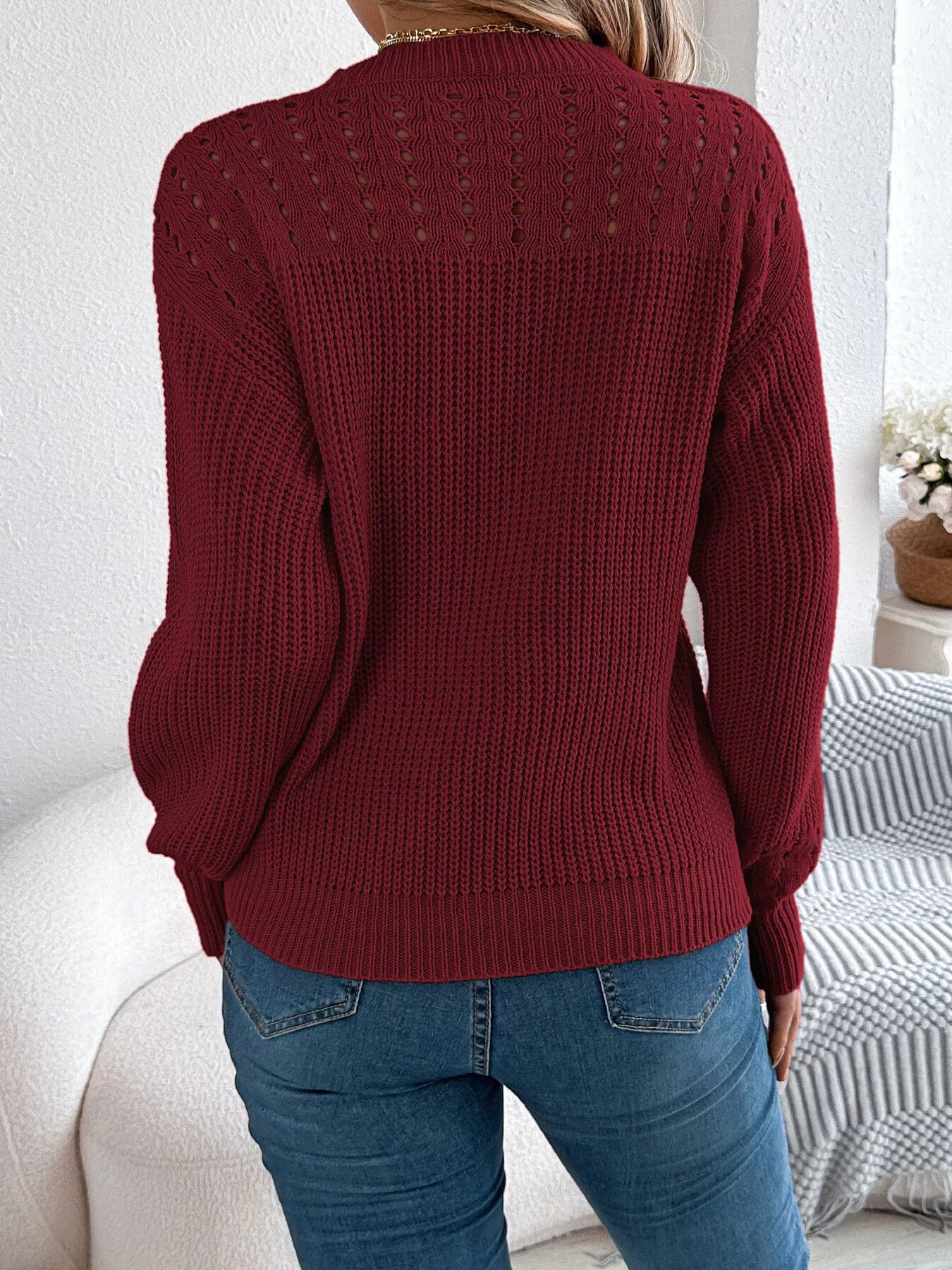 Openwork round neck long sleeve sweater back view breathable knit pattern