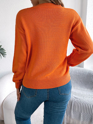 Back view of openwork round neck long sleeve sweater breathable knit pattern