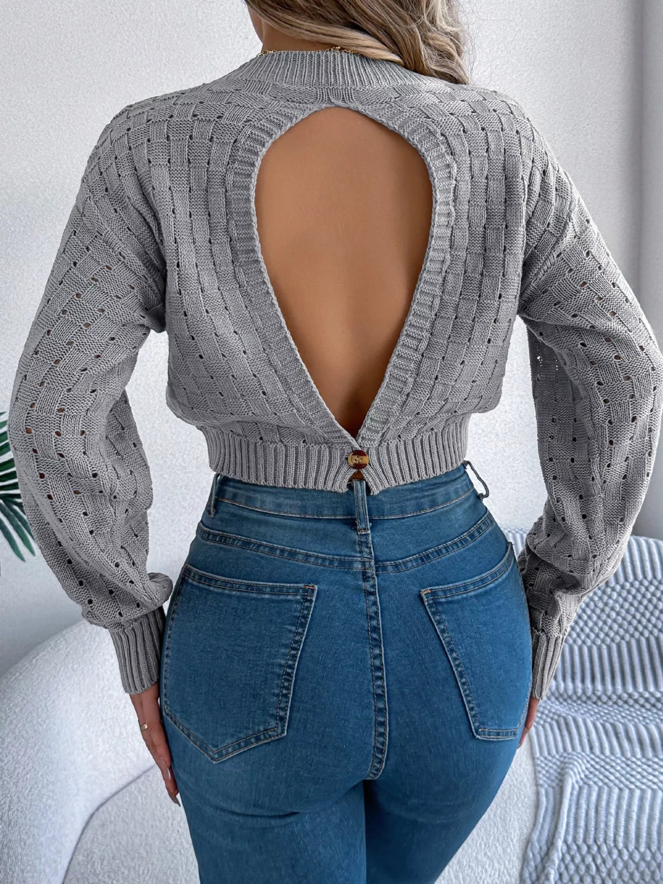 full back view of cutout back openwork sweater
