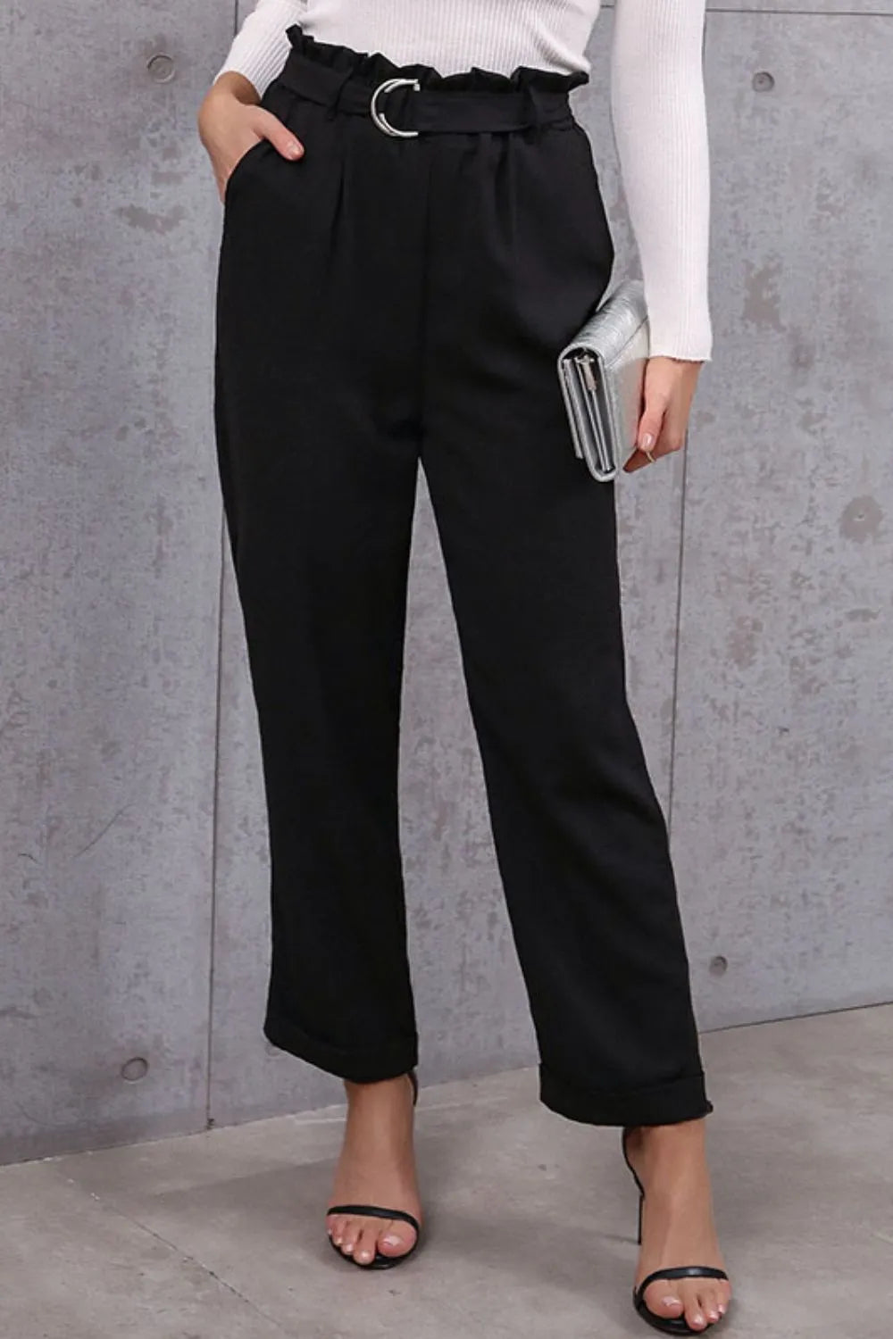 Front view of belted paperbag waist pants for women with high waist design