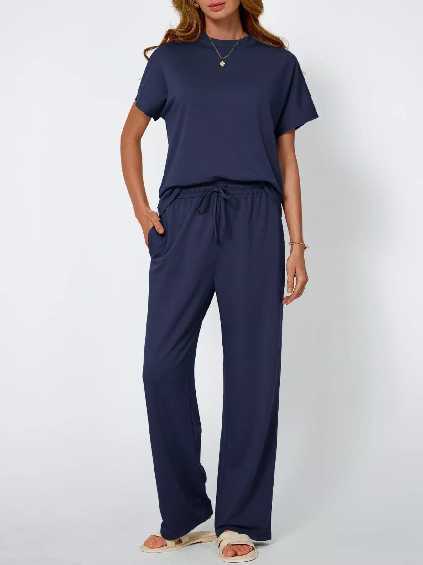 Front view of full size round neck short sleeve top and pants set