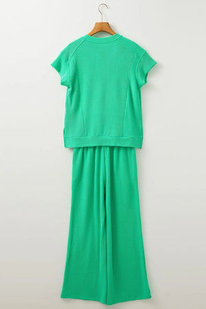 Display of ribbed knit round neck top and pants set