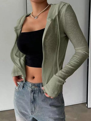 Side view of ribbed knit cropped zip-up outerwear