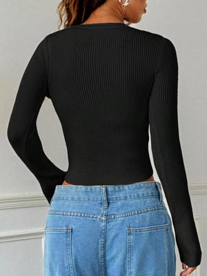 Back view of ribbed knit button-up cropped cardigan