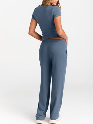 Back view showing full tee and pants design