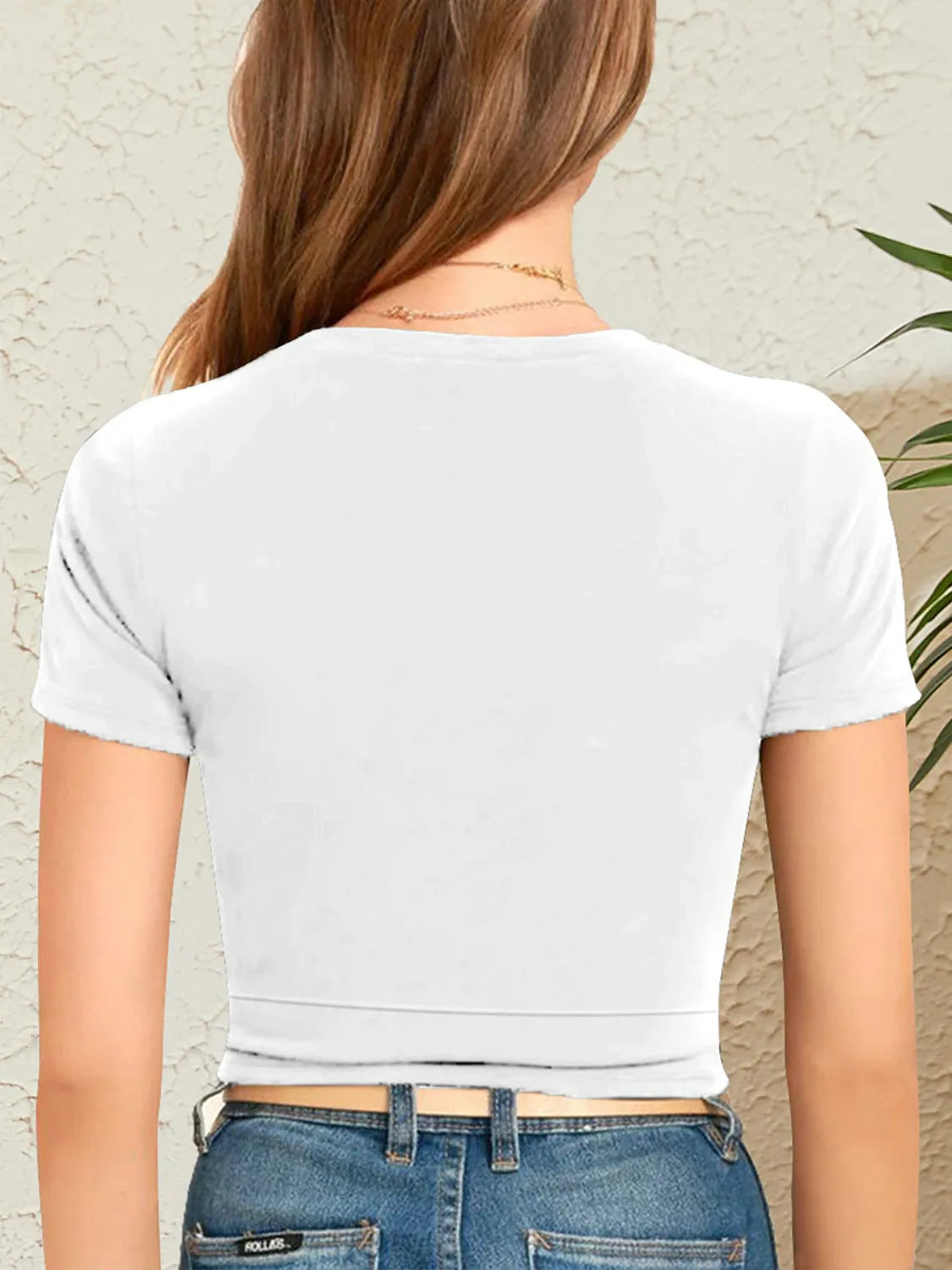 Back view of round neck crop T-Shirt, highlighting comfortable fit