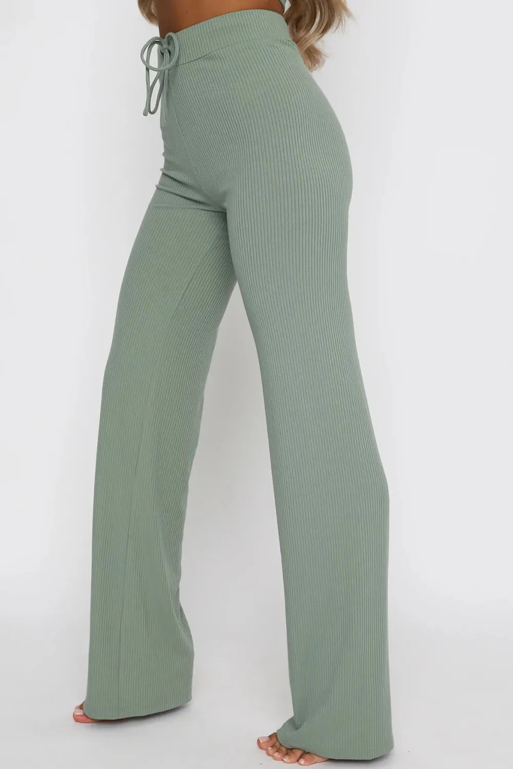 Side view of round neck short sleeve top and pants set