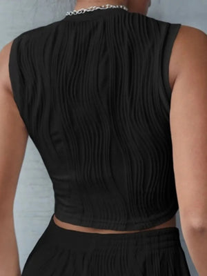 Round neck cropped tank back view showing comfortable fit and clean lines
