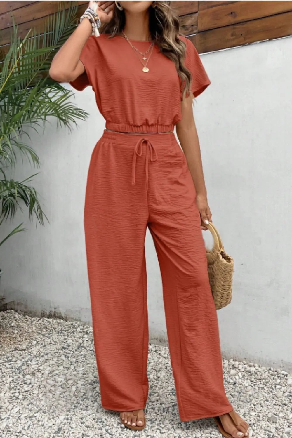 Model in casual pose wearing the set