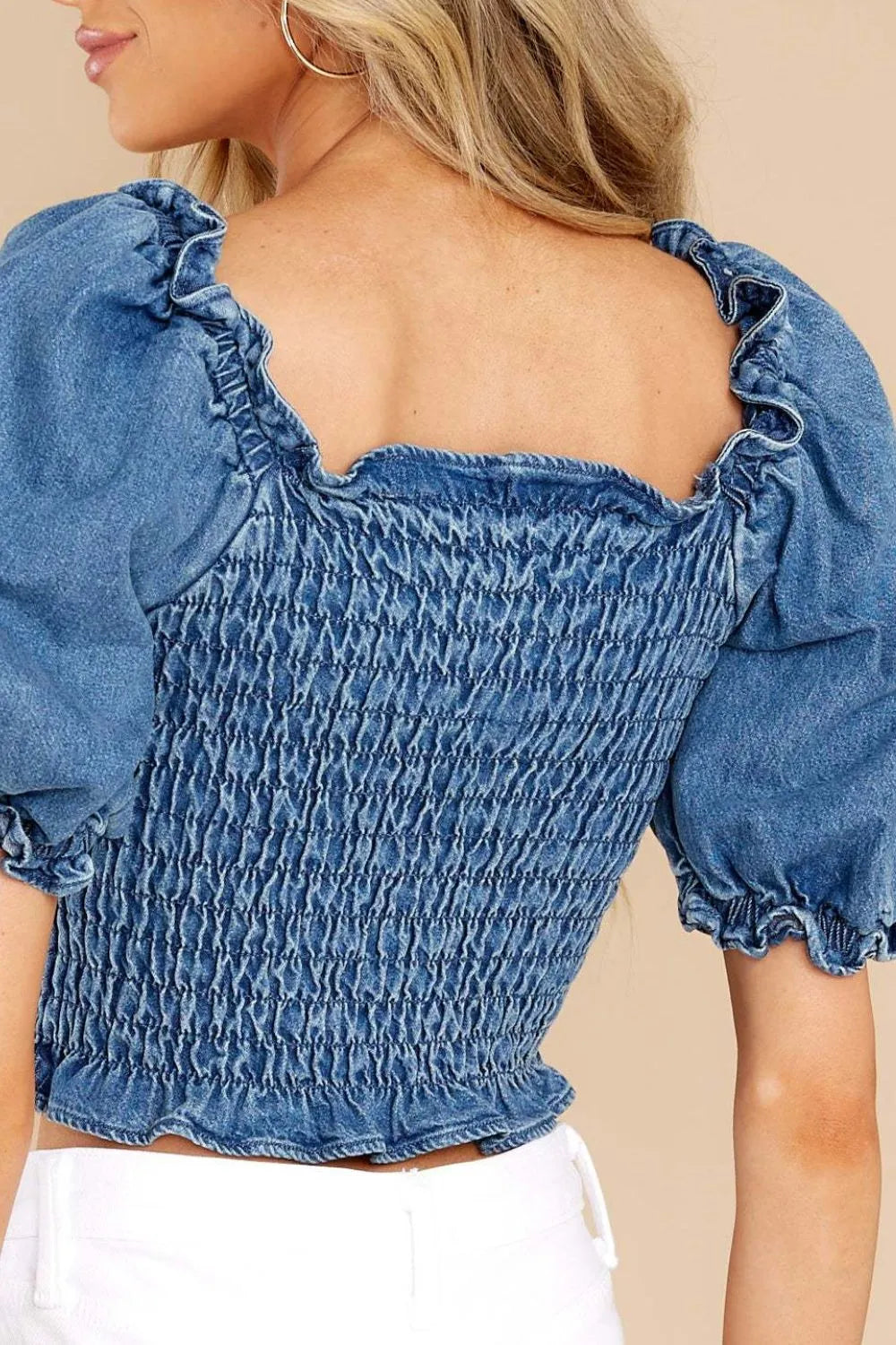 Back view of puff sleeve smocked cropped denim top