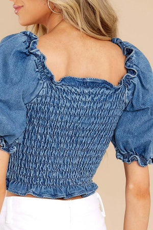 Back view of puff sleeve smocked cropped denim top
