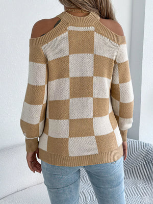 Back profile of cold shoulder checkered sweater
