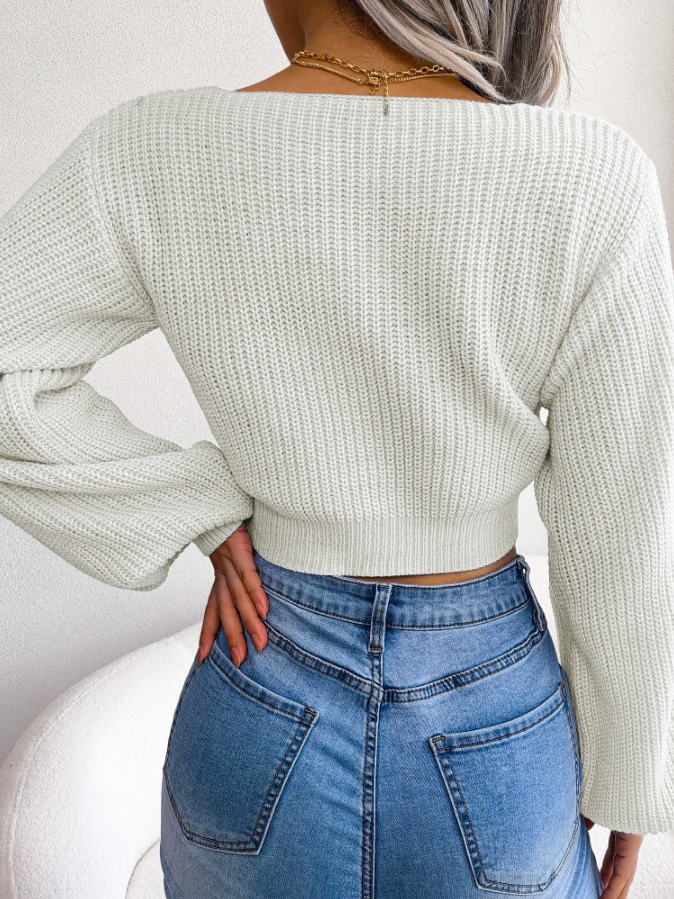 Cropped sweater back view long sleeve simple design