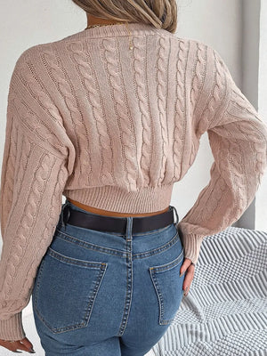Twisted cable knit V-neck sweater back view long sleeve cozy design