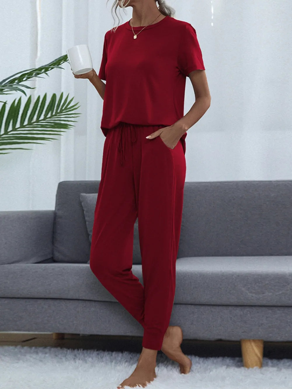 Model wearing Shiny Round Neck Top and Pants Lounge Set