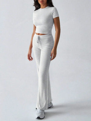 Front styling view of round neck short sleeve top and pants set