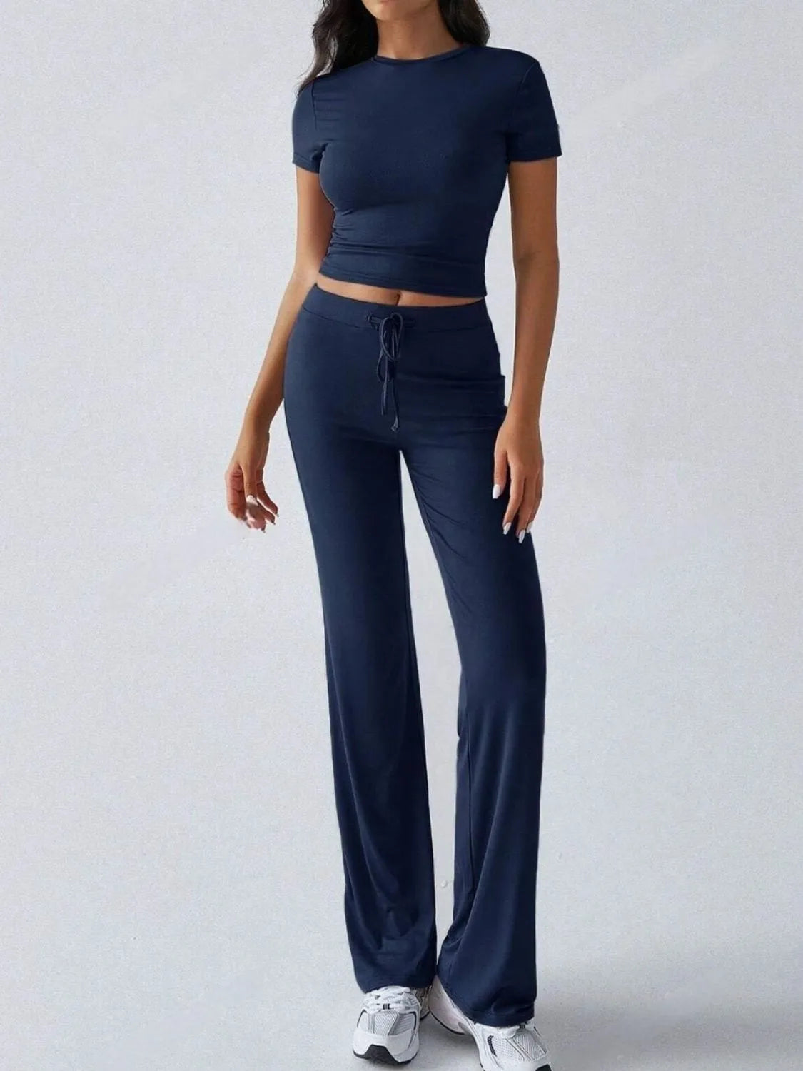 Front modern style of round neck short sleeve top and pants set