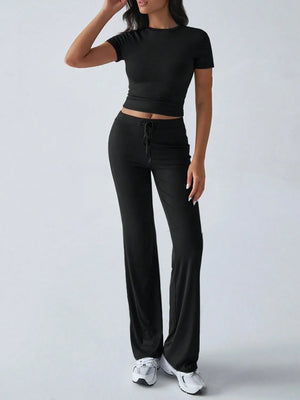 Front angle view of round neck short sleeve top and pants set