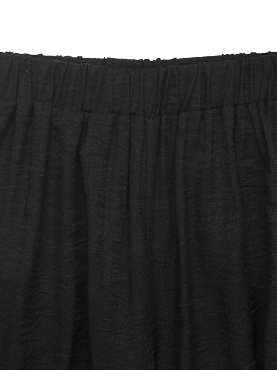 Flat lay view of sleeveless pants set