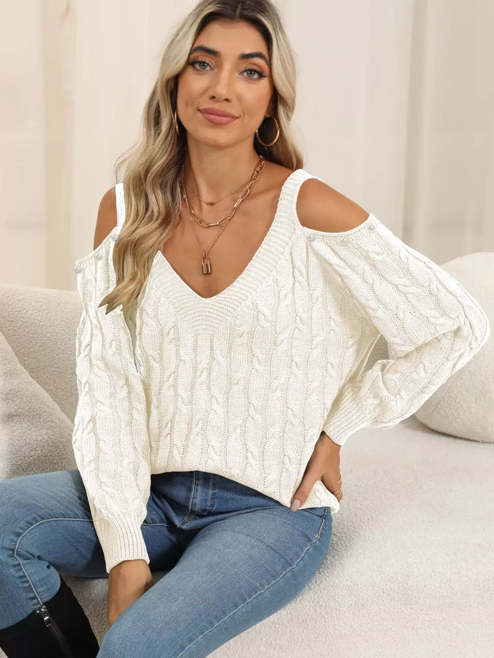 Women's Cable-Knit Cold Shoulder Sweater front display for winter fashion