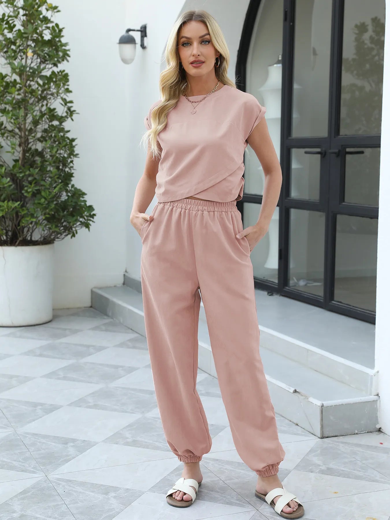 Front relaxed fit look of round neck top and pants