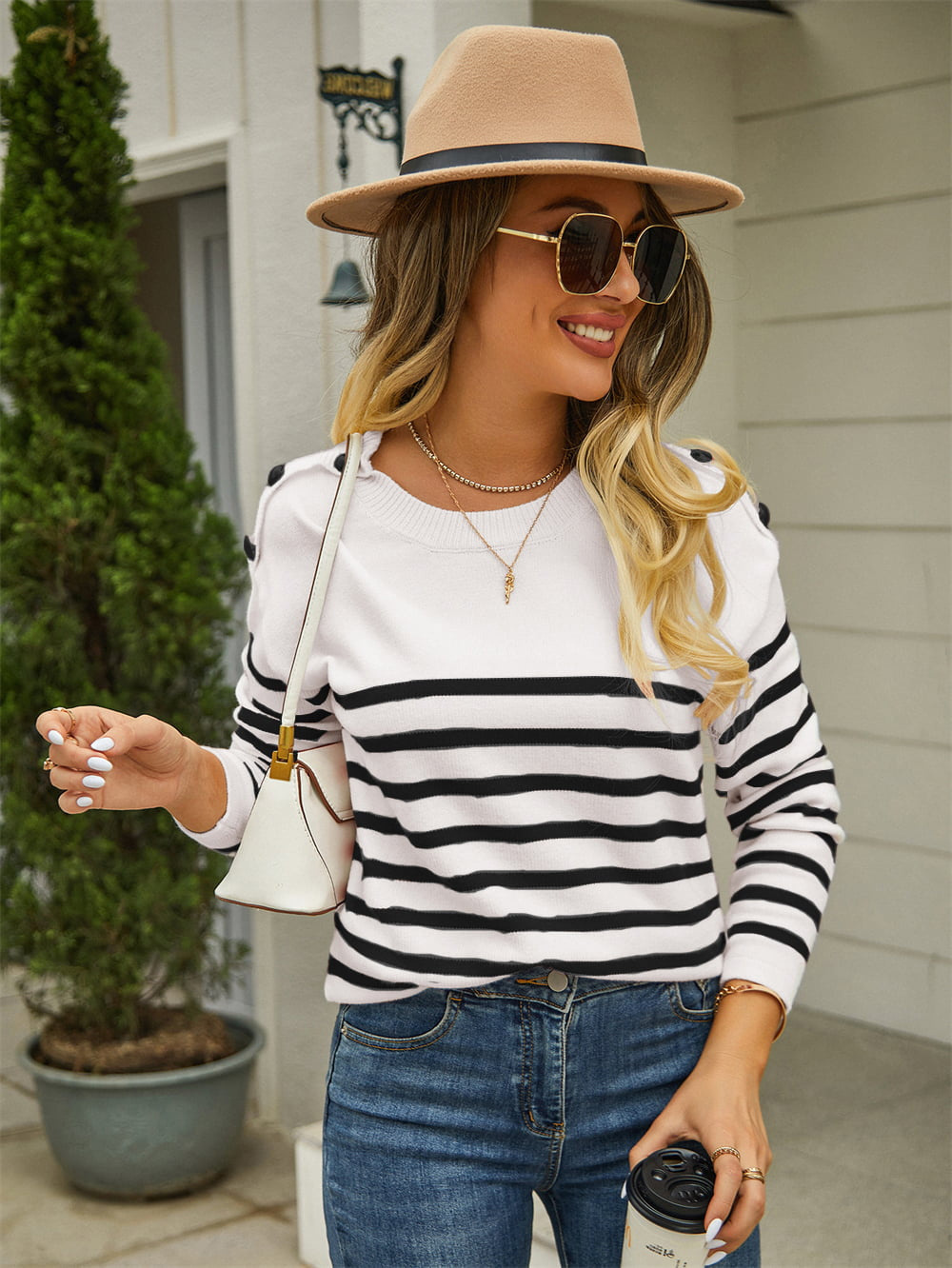 Front view striped knit sweater with angel wings pattern
