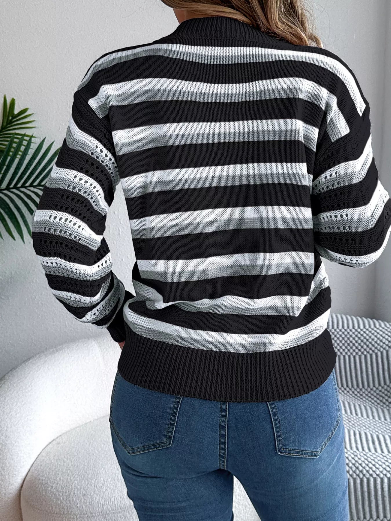Back view of Striped Round Neck Long Sleeve Sweater with striped knit design