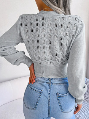Back design of mock neck openwork cropped sweater