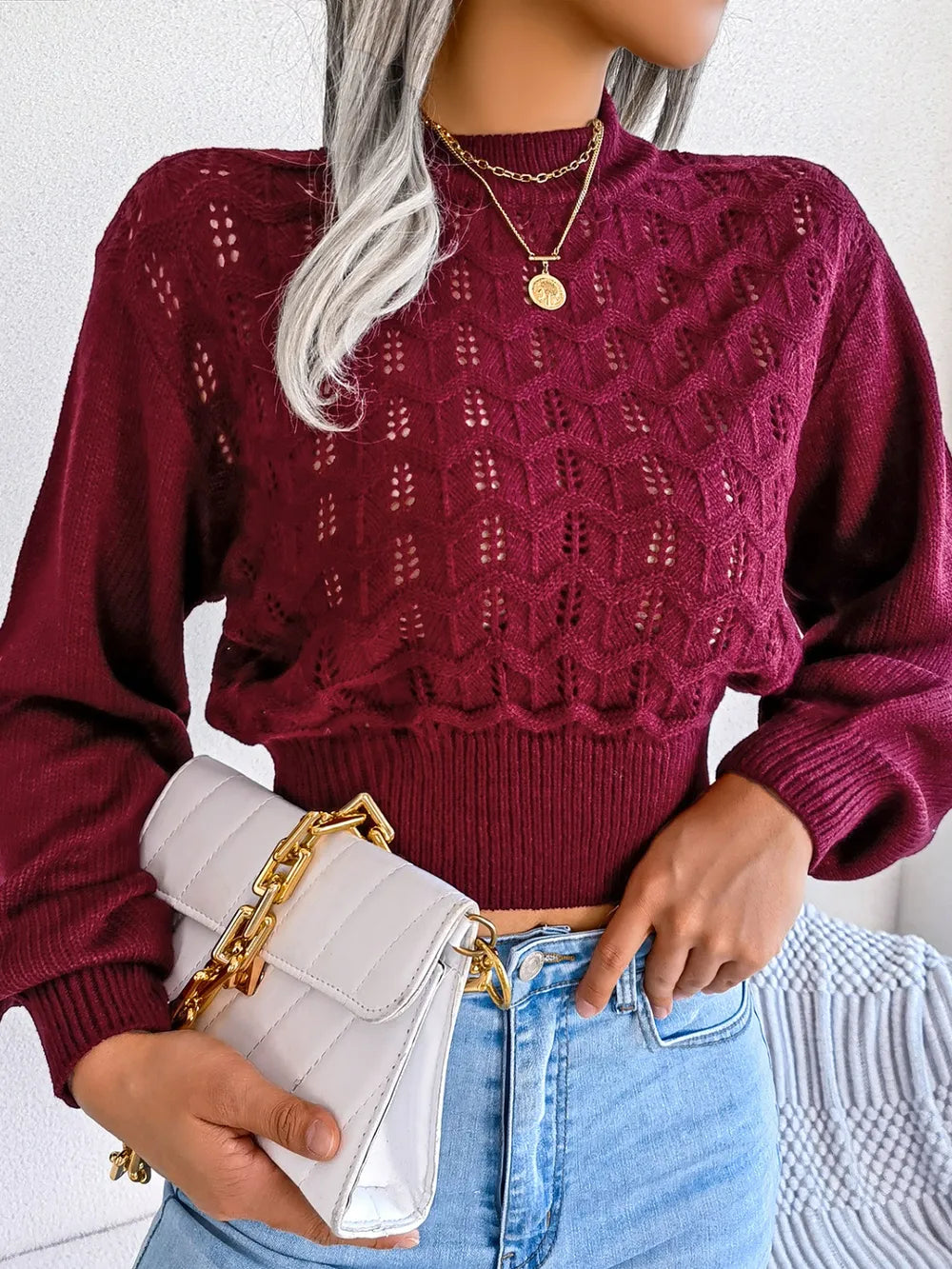 Openwork knit cropped sweater worn from front