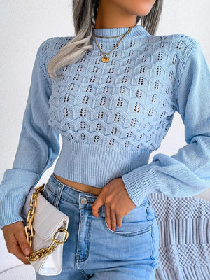 Side angle look of long sleeve openwork cropped sweater