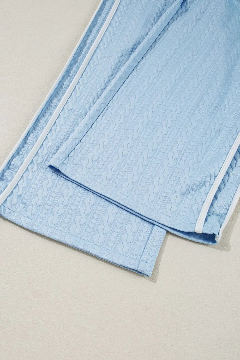 Textured high waist pants detail view