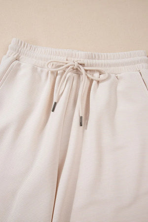 Front display of textured top and wide leg pants set