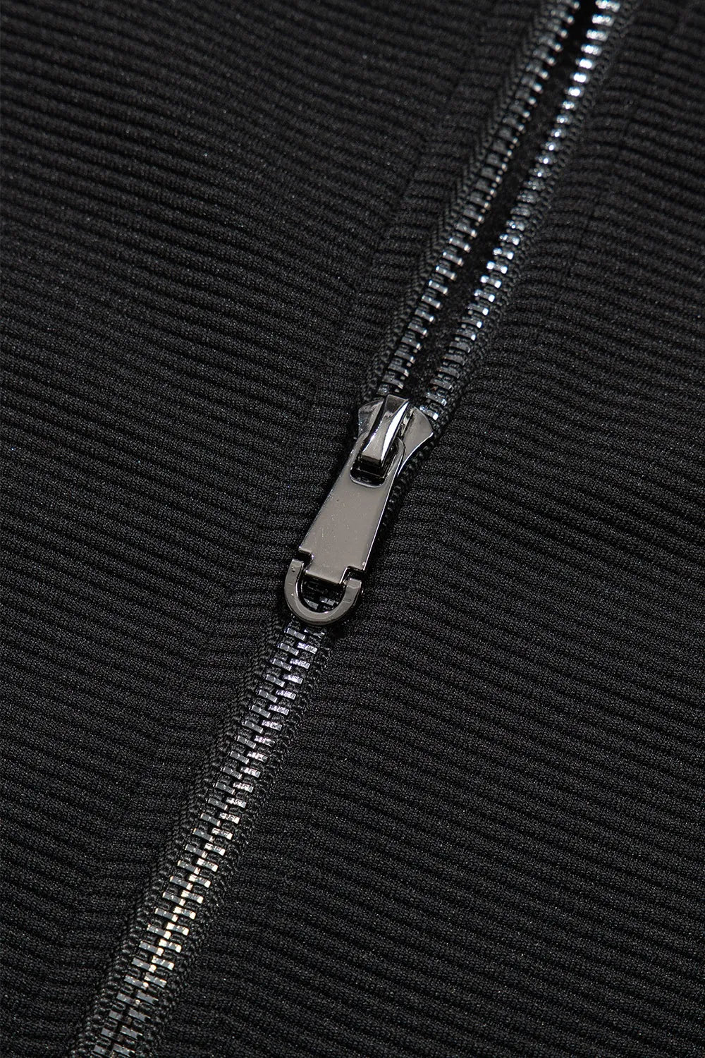 Display of textured top and pants for detail