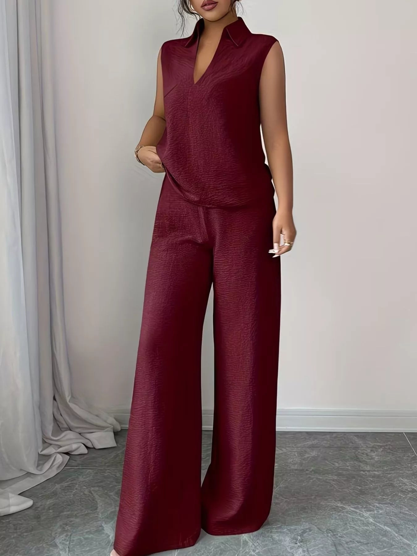 trendy sleeveless top and pants set front