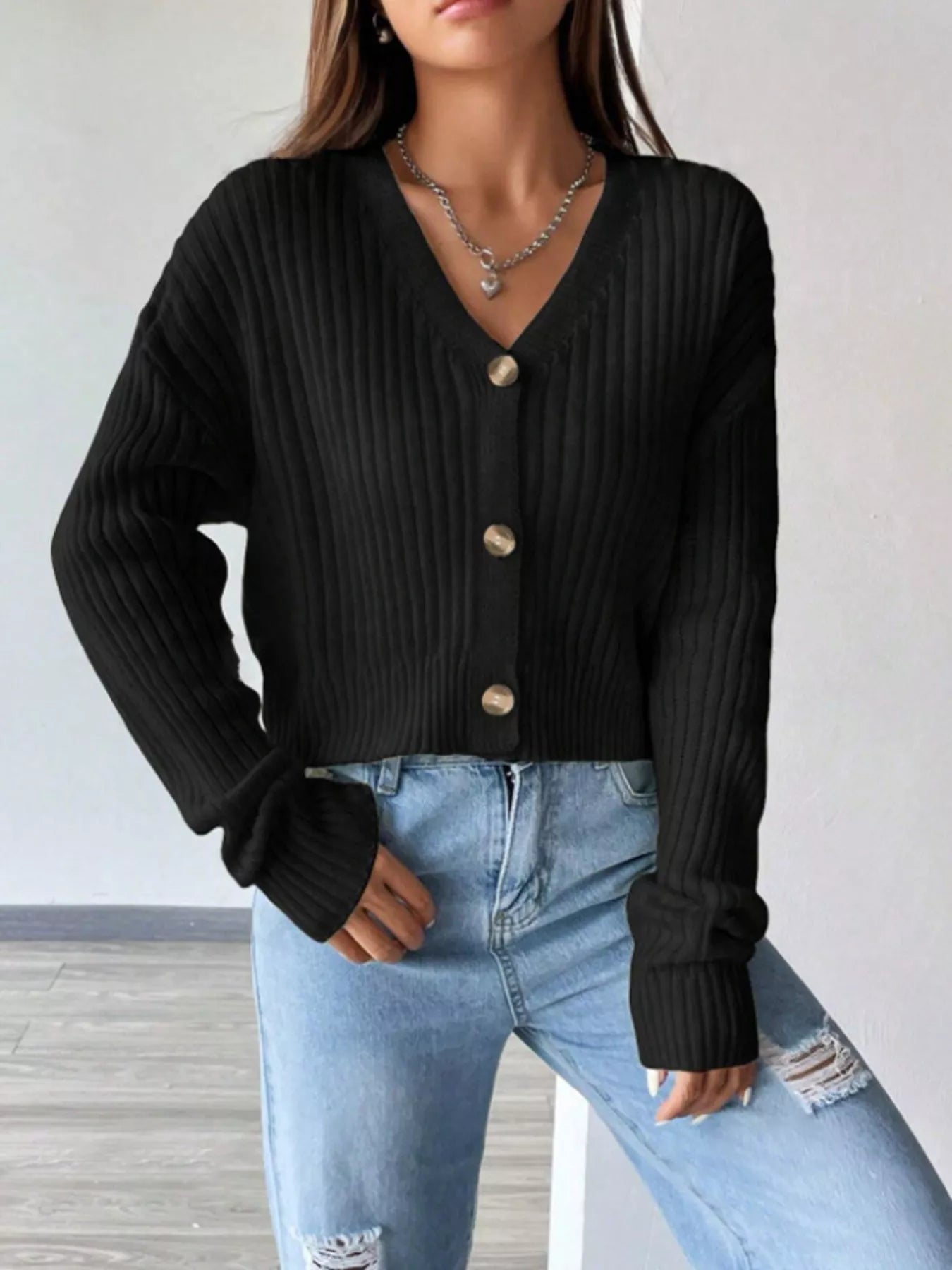 Front view of V-neck button-up cardigan