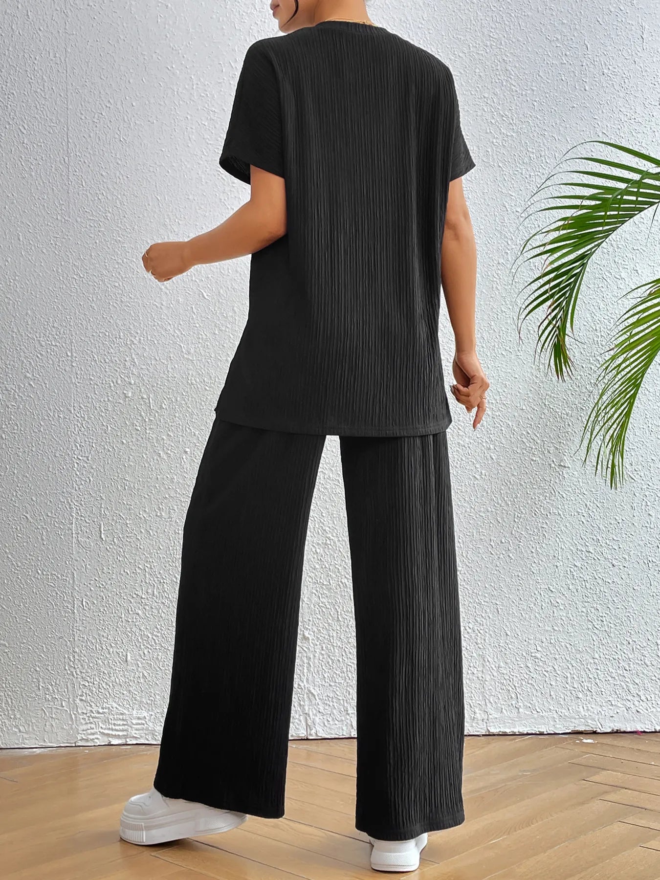 Back view of V-neck short sleeve top and pants set for women