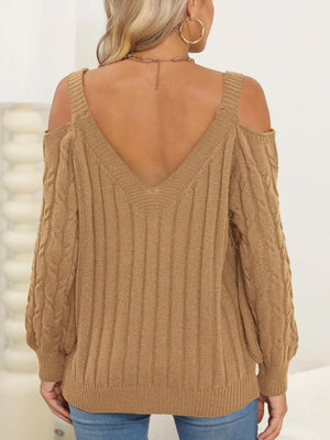 Rear view of Cable-Knit Heart V-Neck Sweater with cozy winter style