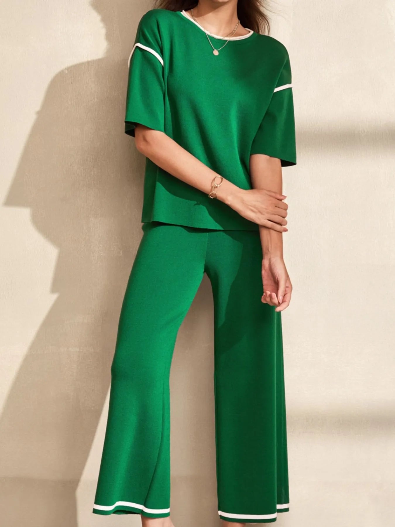 Side view of contrast trim t-shirt and drawstring pants set