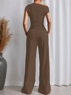 women single shoulder top and pants set back design